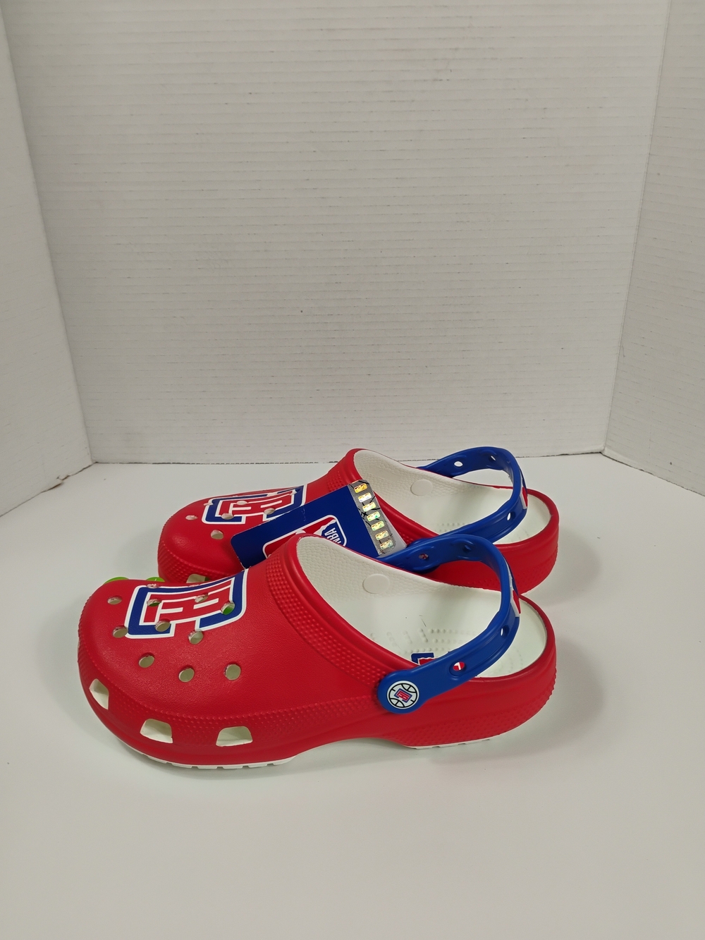 CROCS Red and Blue Slip-On Clogs with Decorative Charms